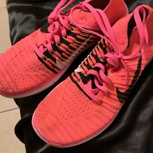 Pink nike running shoes